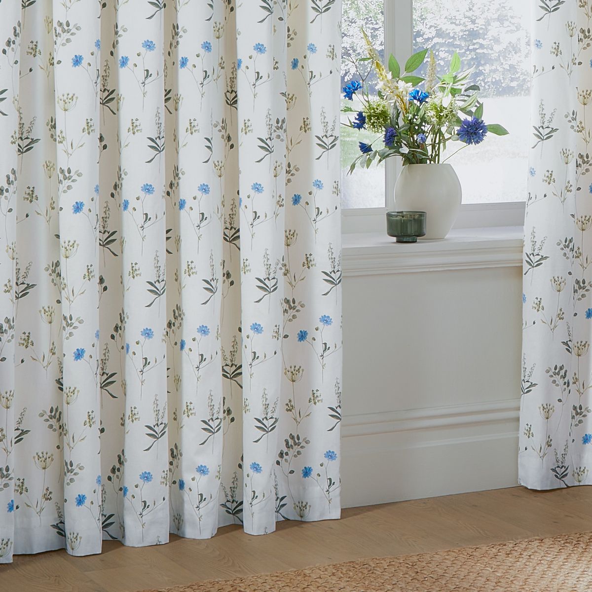 Meadow White / Cornflower Pencil Pleat Curtains Fabric by Wylder - MEADO/C03/WHCO