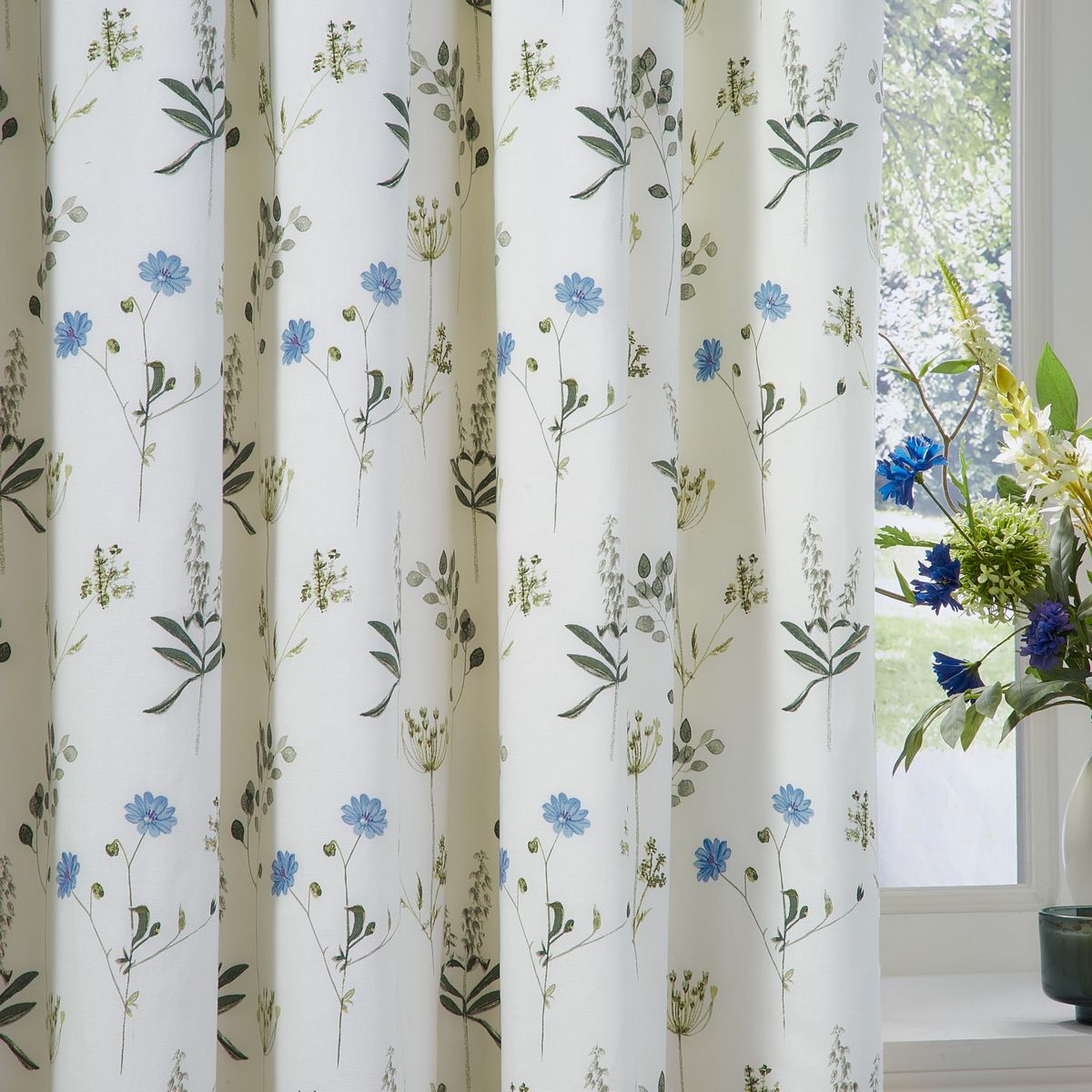 Meadow White / Cornflower Pencil Pleat Curtains Fabric by Wylder - MEADO/C03/WHCO
